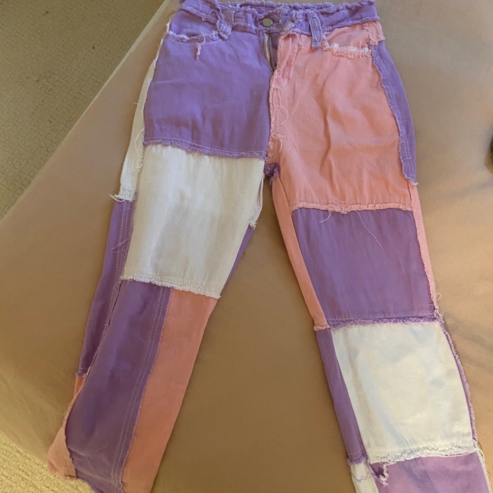 PATCHED JEANS NEVER WORN